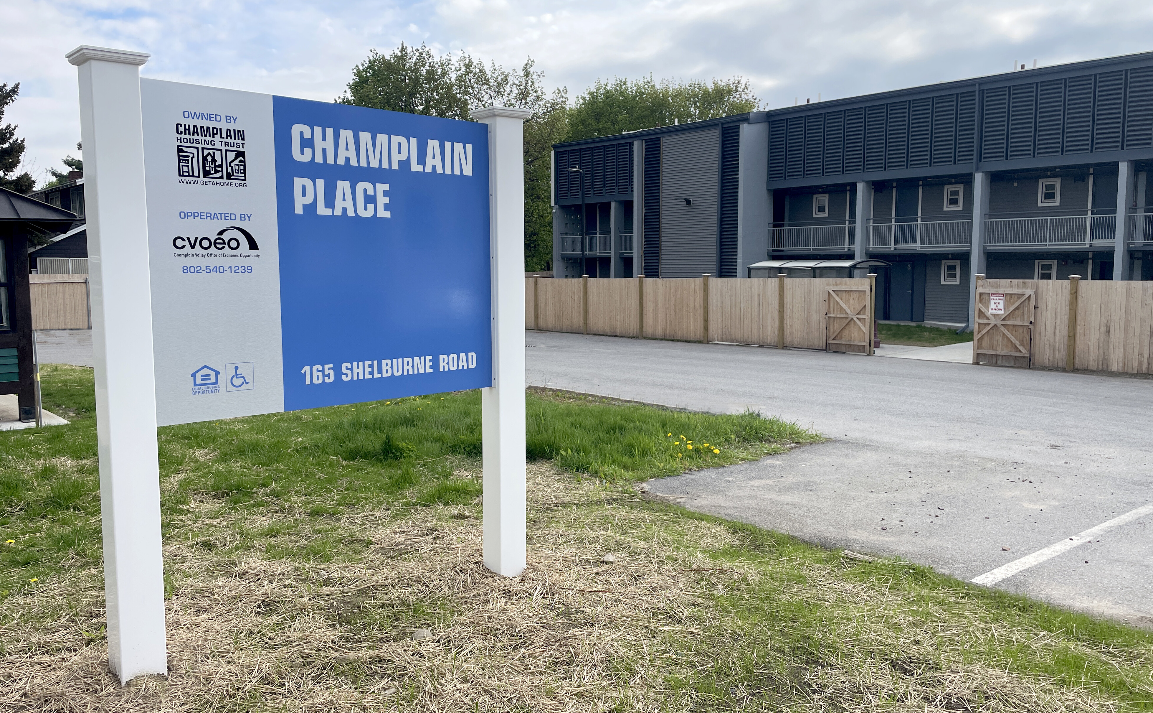 New construction Champlain Place sign outside of shelter
