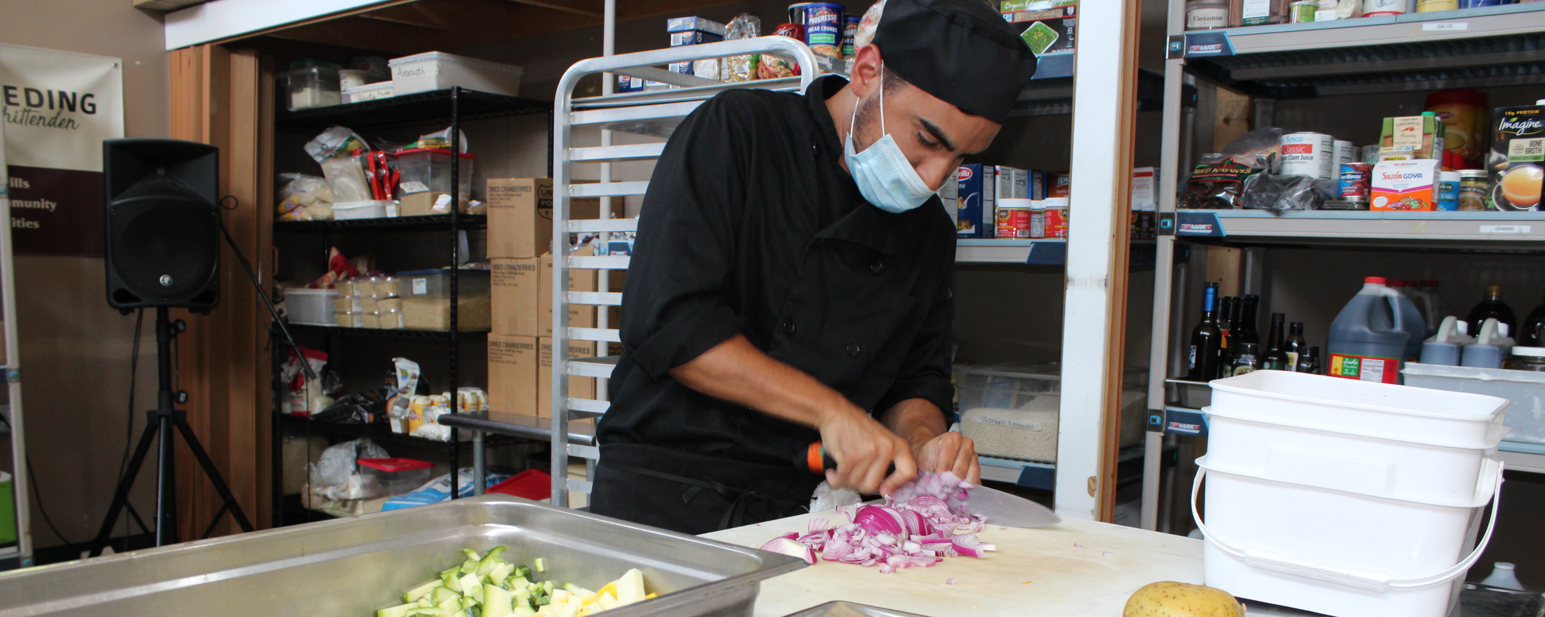 Student cutting onions